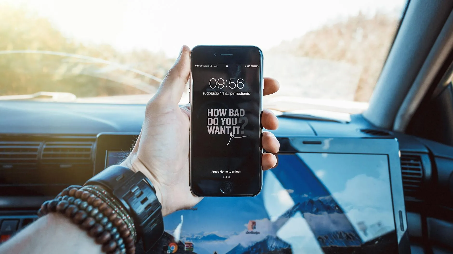 Smartphone showing notification alerts for car listings